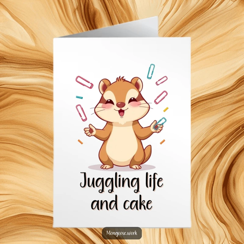 Funny Free Printable Birthday Card: A cute mongoose intensely juggles paper clips, showcasing extreme concentration.